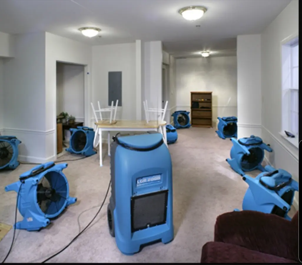 Air movers and dehumidifier setup for Water Damage Restoration in New Bedford